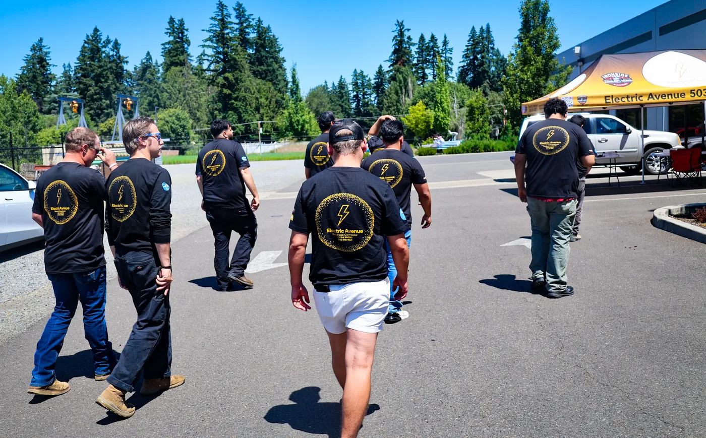 The Electric Avenue PNW crew on site in their branded shirts