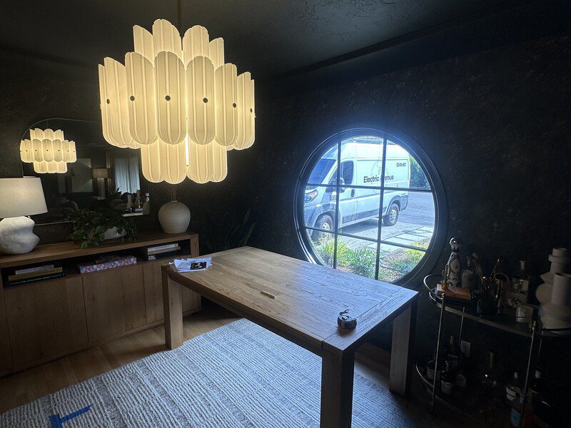 High-end chandelier installation in a Portland metro home